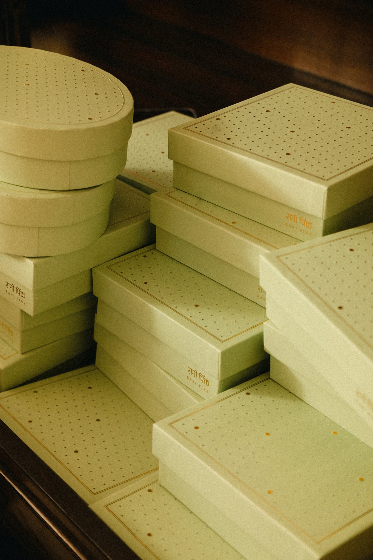 Our old-fashioned square mithai boxes come in the prettiest shades of powder pink and pista green, adorned with tiny embossed silver dots and delicate gold Mughal stars.

Thoughtfully designed for kaju katli, motichoor laddoos, and other Indian sweets, these traditional sweet boxes bring a little extra charm to festive gifting, weddings, intimate celebrations, and thoughtful gestures.

Beautifully wrapped treats, made for little celebrations and the pleasure of sending something sweet to someone you love.