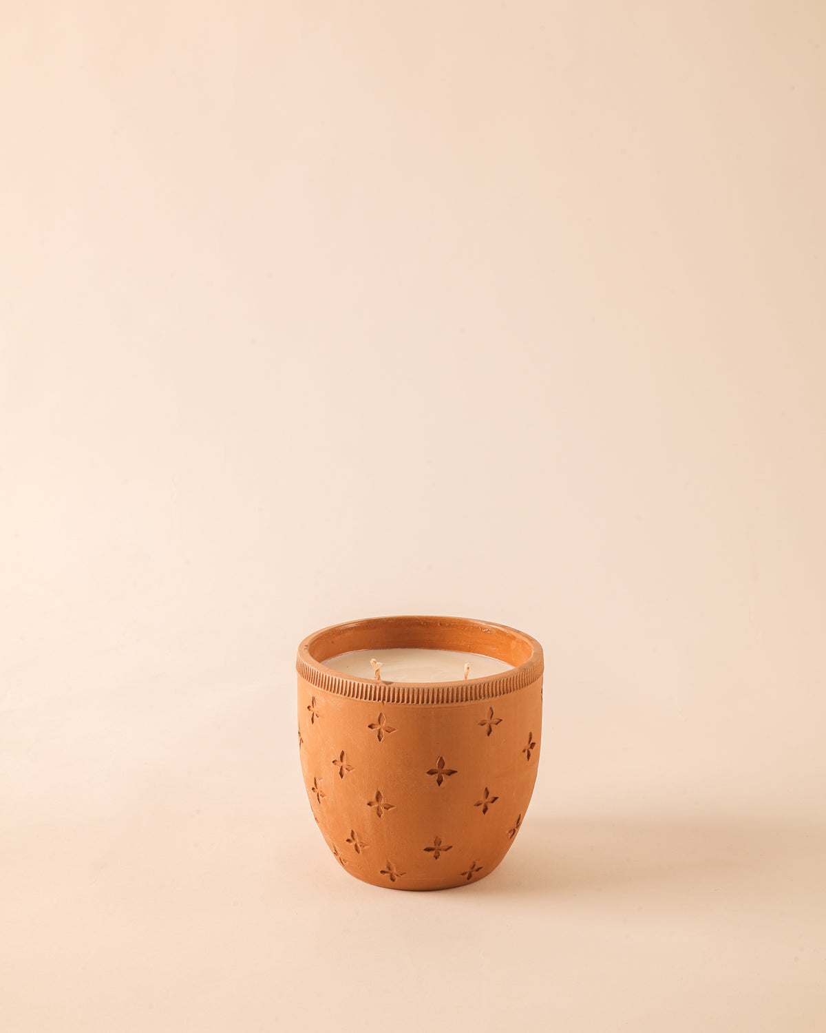 Tiny white flowers bloom again in the back garden, and the familiar scent of jasmine drifts through the house. There is a nip in the evening air. Old terracotta diyas return to their familiar corners, and suddenly, the house remembers Diwali.