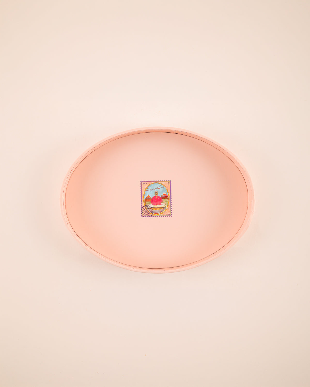 Inspired by old-fashioned mithai boxes, this oval paper sweets box comes in powder pink and pista green, adorned with embossed silver dots and delicate gold Mughal stars. Perfect for gifting mithai, festive treats, and celebrating special moments.