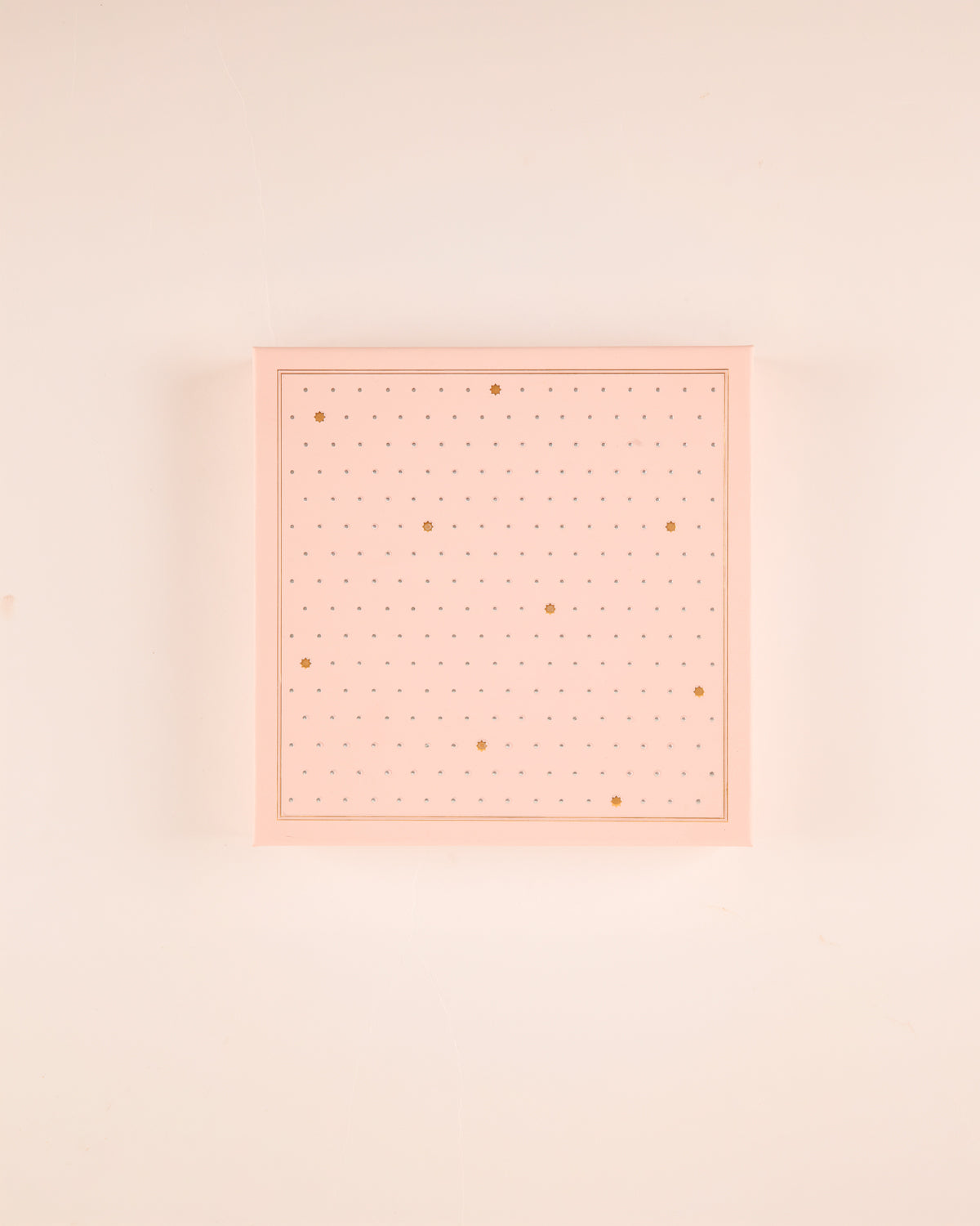 Our old-fashioned square mithai boxes come in the prettiest shades of powder pink and pista green, adorned with tiny embossed silver dots and delicate gold Mughal stars.

Thoughtfully designed for kaju katli, motichoor laddoos, and other Indian sweets, these traditional sweet boxes bring a little extra charm to festive gifting, weddings, intimate celebrations, and thoughtful gestures.

Beautifully wrapped treats, made for little celebrations and the pleasure of sending something sweet to someone you love.